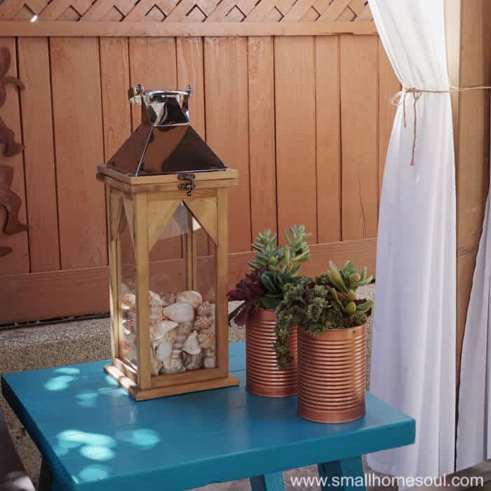 Lanterns aren't just for lighting in your relaxing backyard retreat.