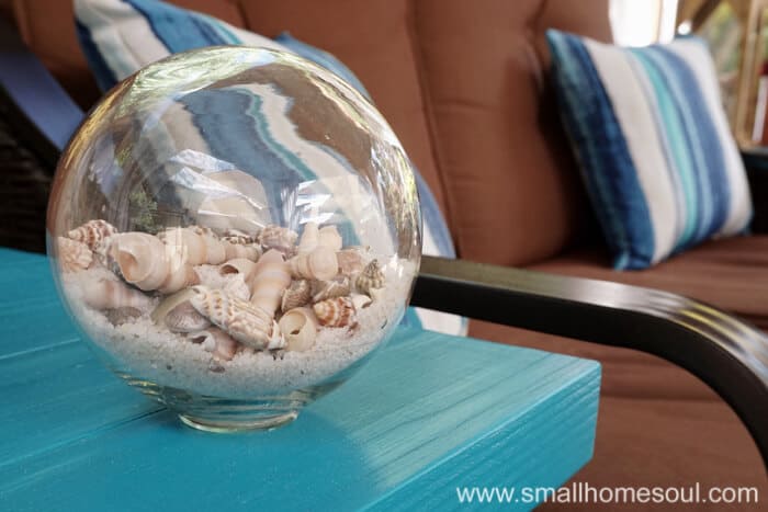 A seashell globe is perfect for a relaxing backyard retreat.