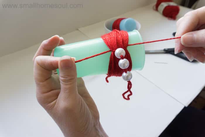 Tie beads to Christmas Tassel Ornament.