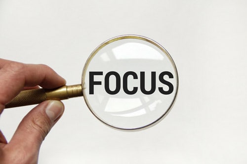 Focus on what's important this year magnifying glass.