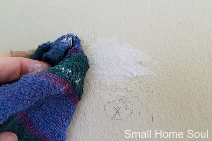 Before you paint a room blend the spackle over holes.