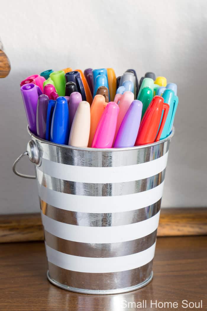 Bucket full of sharpies for office makeover.
