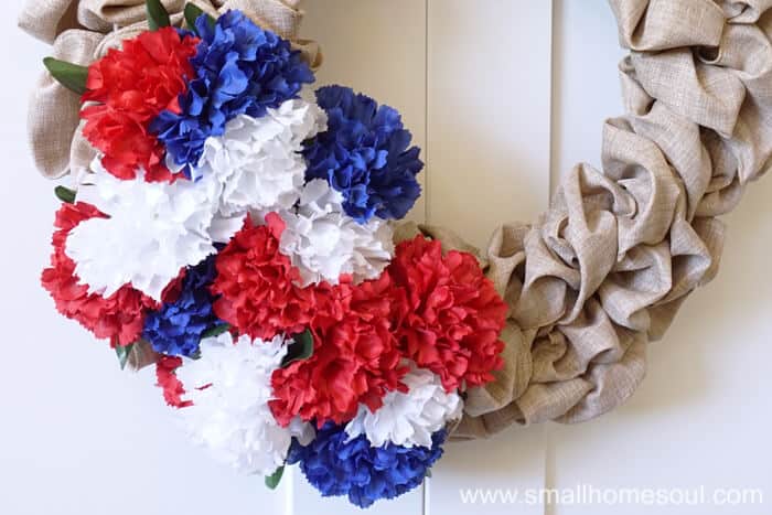 Bunches of carnations make the July 4th Wreath pop for 4th of July.