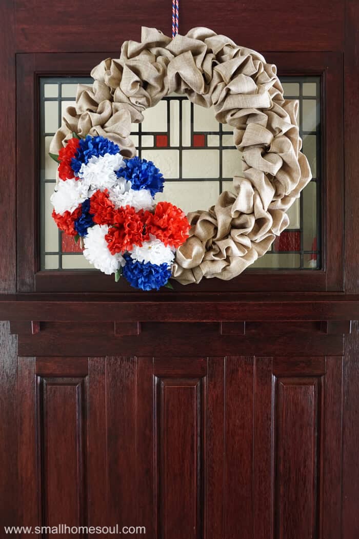 July 4th wreath hung on the front door for 4th of July.