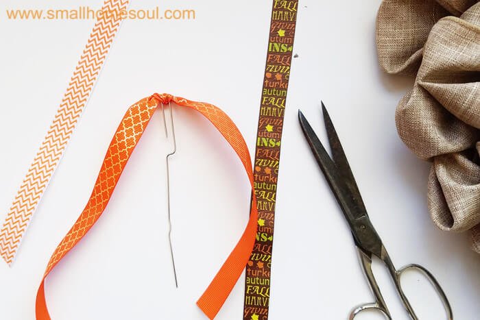 Making a ribbon pick during Fall decor updates. Fall wreath pumpkin wreath.