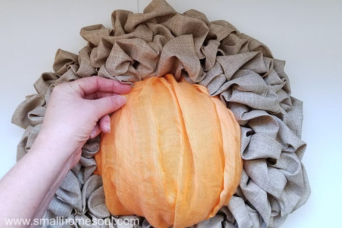 An easy Fall decor update using a scarf as a pumpkin. Fall wreath pumpkin wreath.