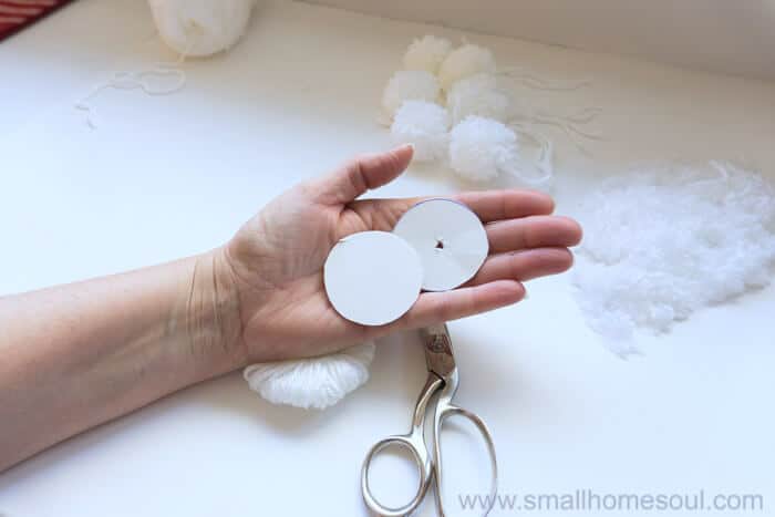 Cardboard circles for the perfect pom pom.