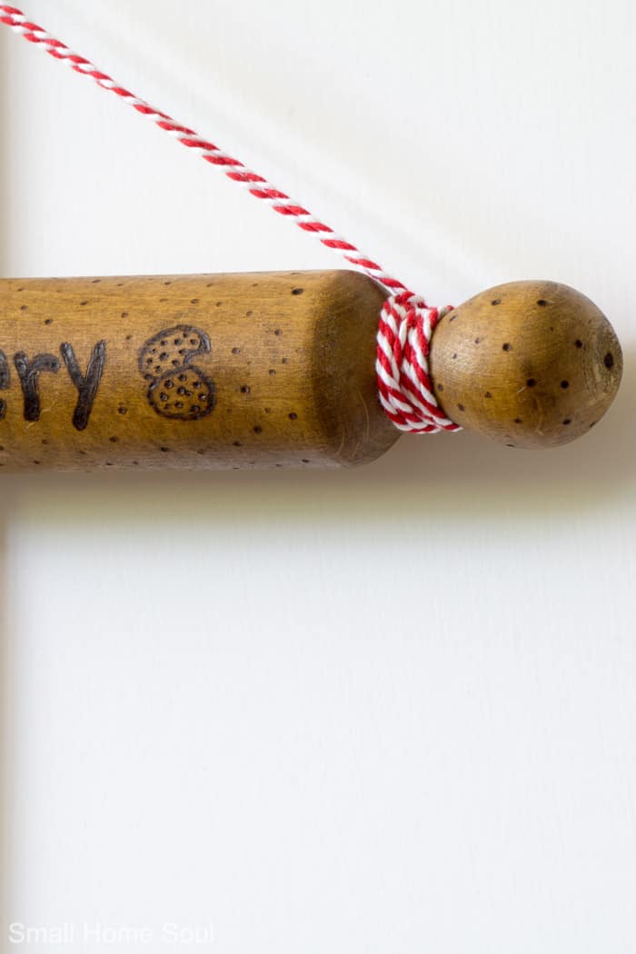 Cookies on the wooden rolling pin.