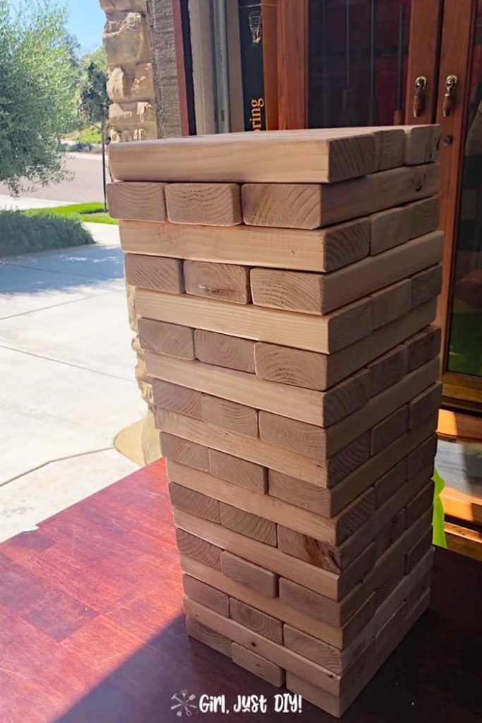 Playing a game of giant Jenga on Black Beauty's back deck is the